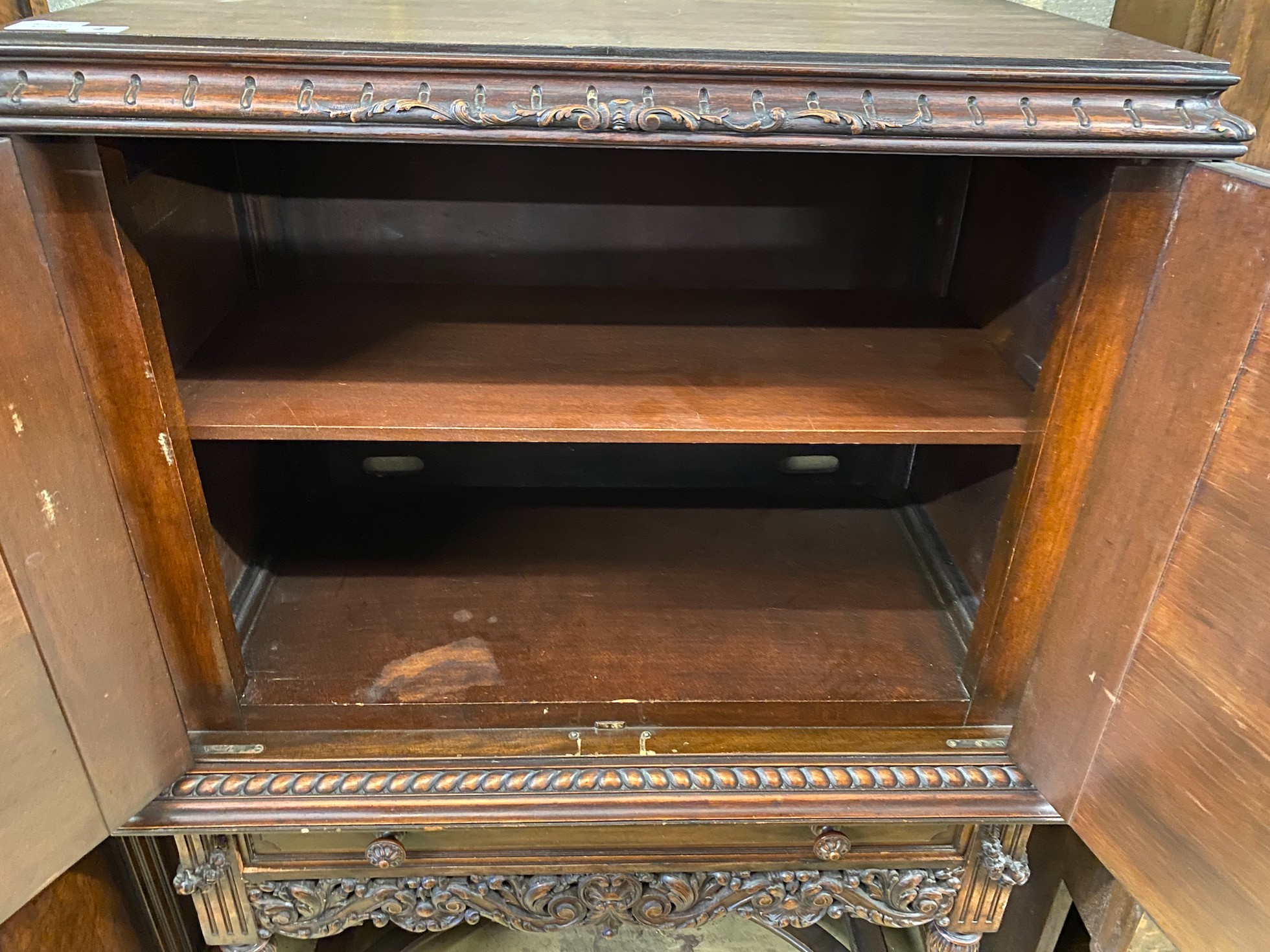 A 17th century style oak cocktail cabinet on stand, width 90cm, depth 50cm, height 137cm